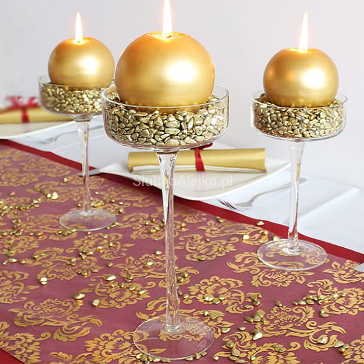 swiecznik szklany na nodze raut.jpg