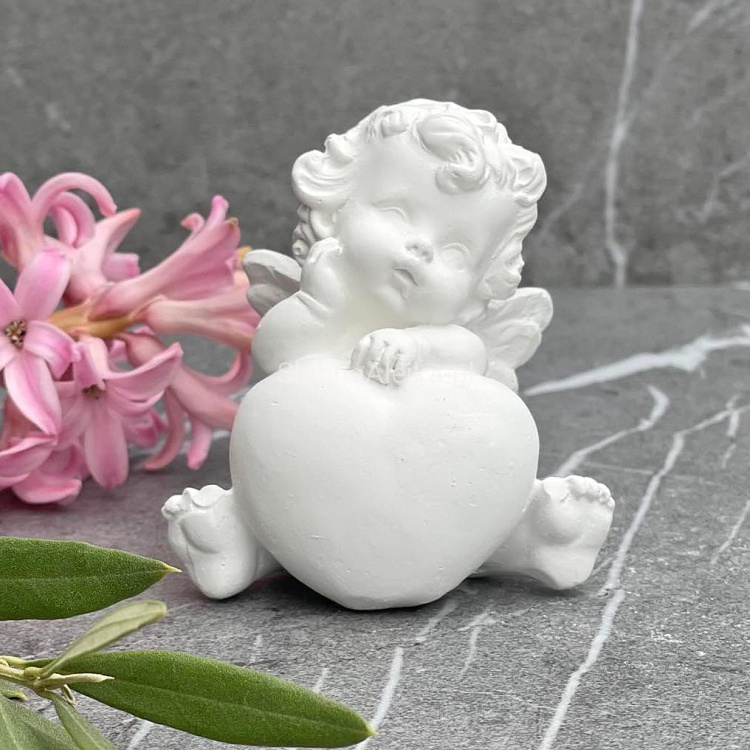 aniolek spiący na sercu figurka komunijna biały 7 cm.jpg